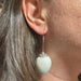A woman wearing the Quail Egg Earring
