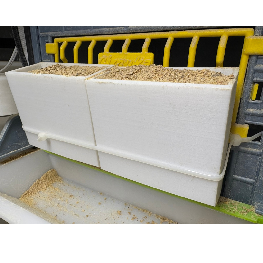 Adjustable feed flow quail feeder