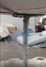 Bulk bag dispenser for controlled unloading of feed, grain, and seed