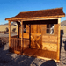 CedarShed Kids Bunkhouse front with small porch cedar roof