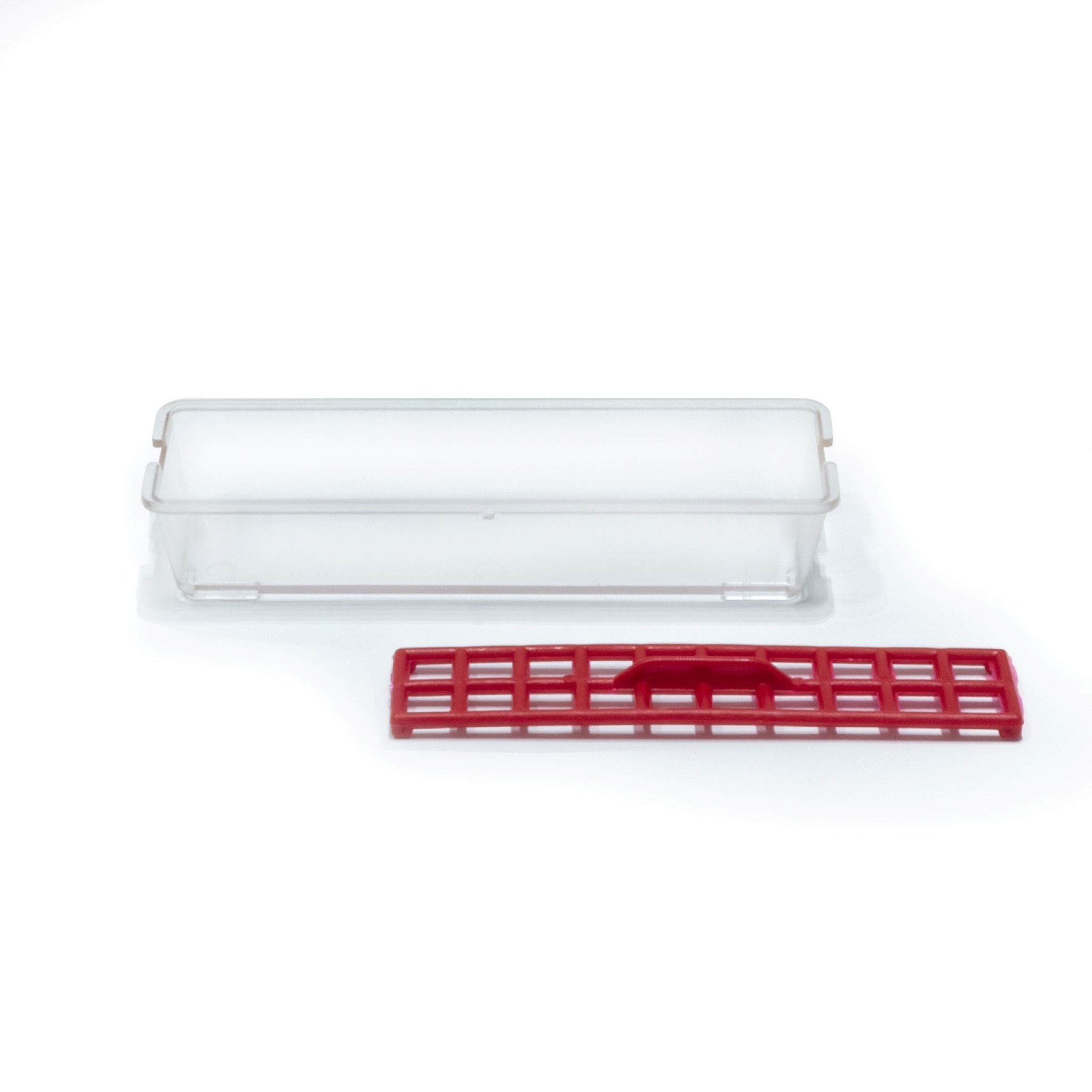 Compact starter feeder with red feed grill for chicks.