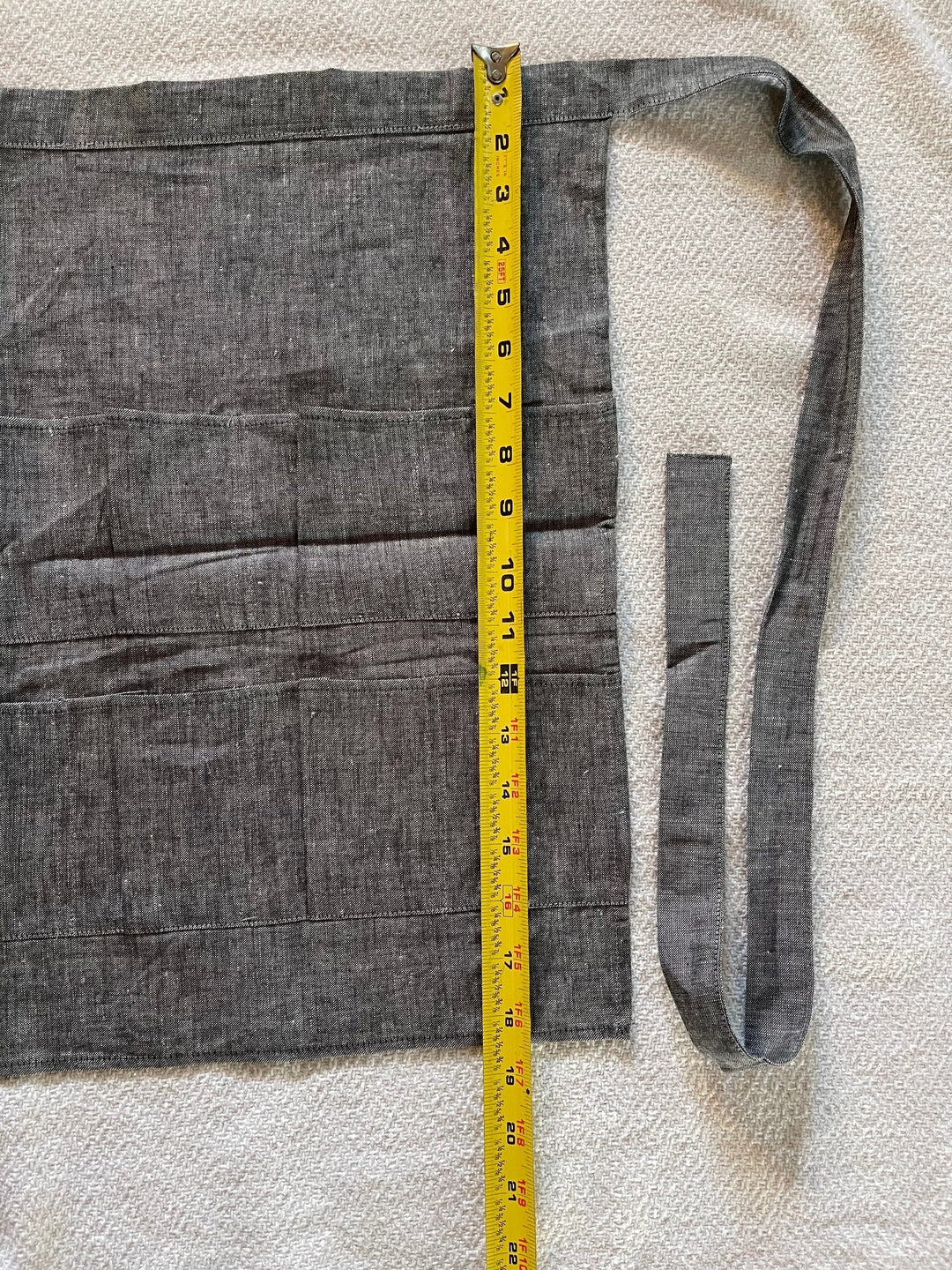 Grey denim egg collecting apron length