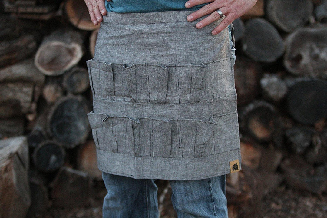 Grey denim egg collecting apron with egg pockets