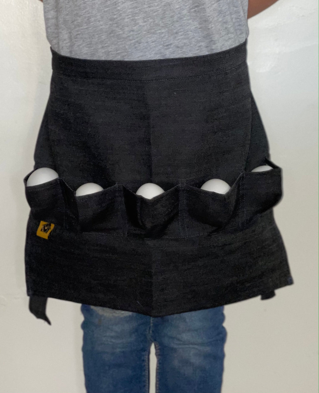 Kids black denim egg gathering apron with 5 pockets