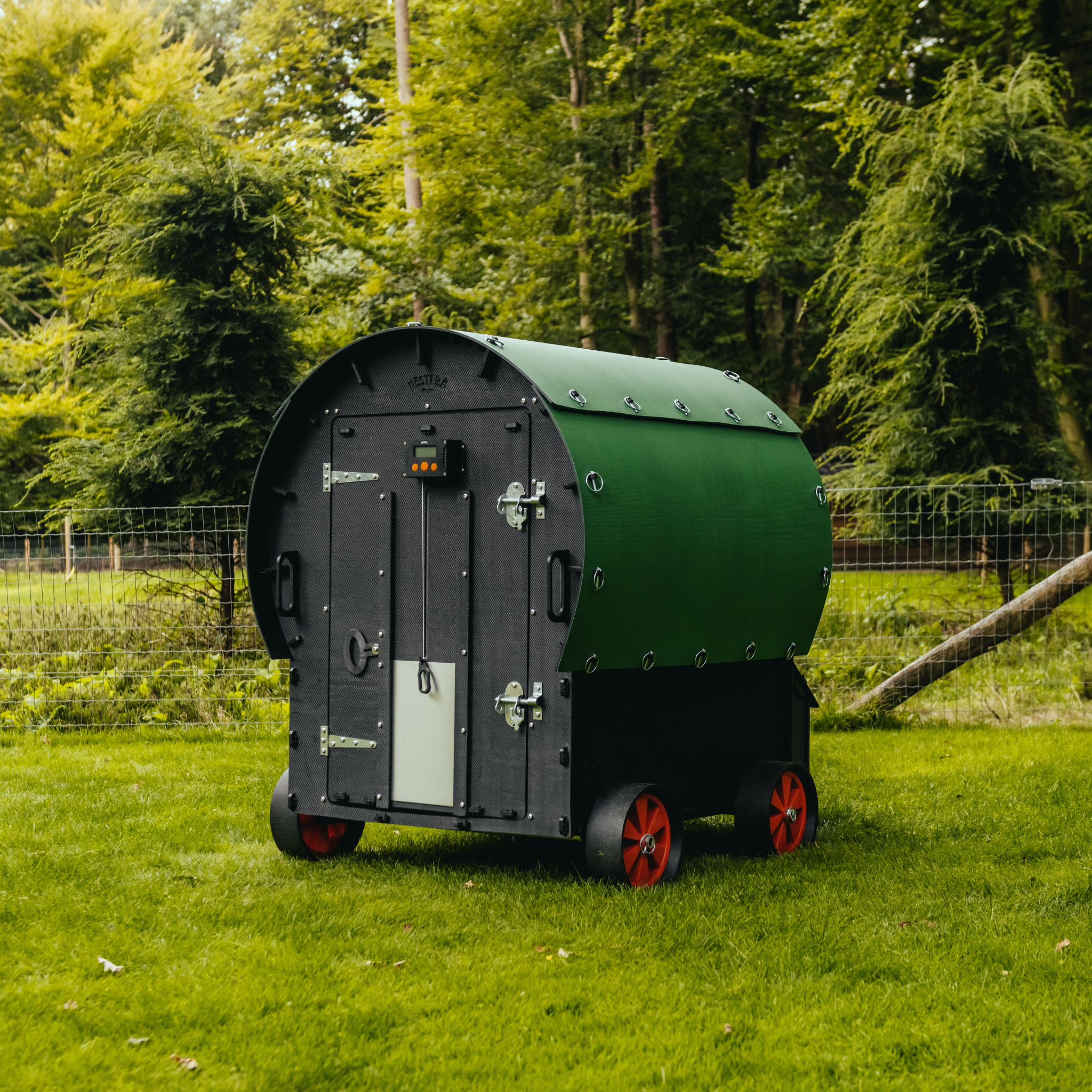 Nestera Wagon recycled plastic chicken coop with four wide wheels back