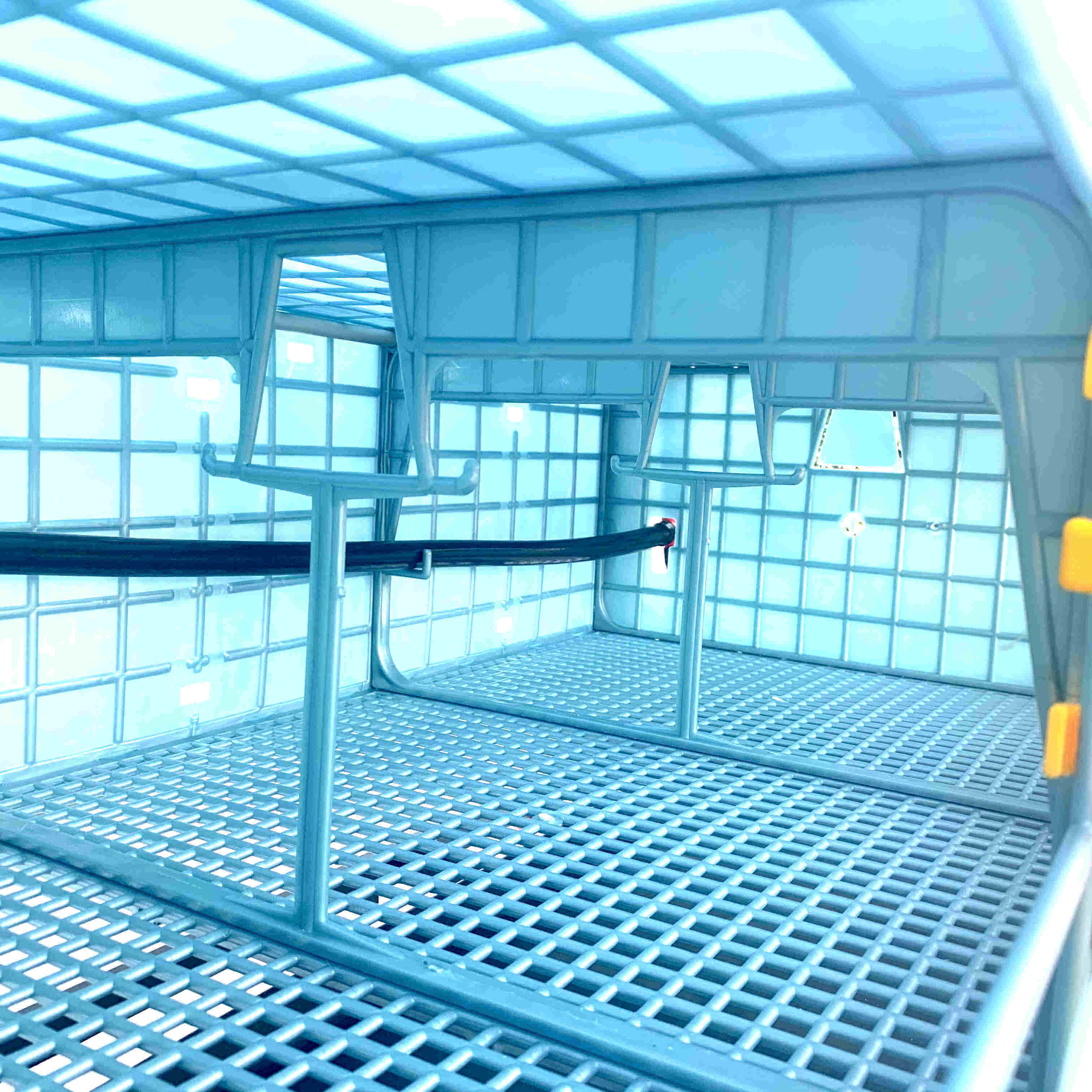Power-washable Cimuka grow-out pen layer addition for small game bird production.