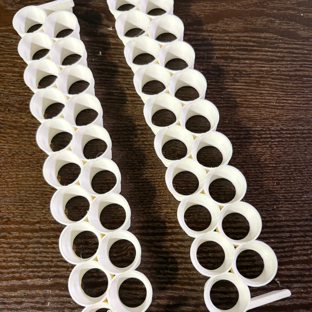 Quail egg rails designed for small 6–8 g Button Quail eggs