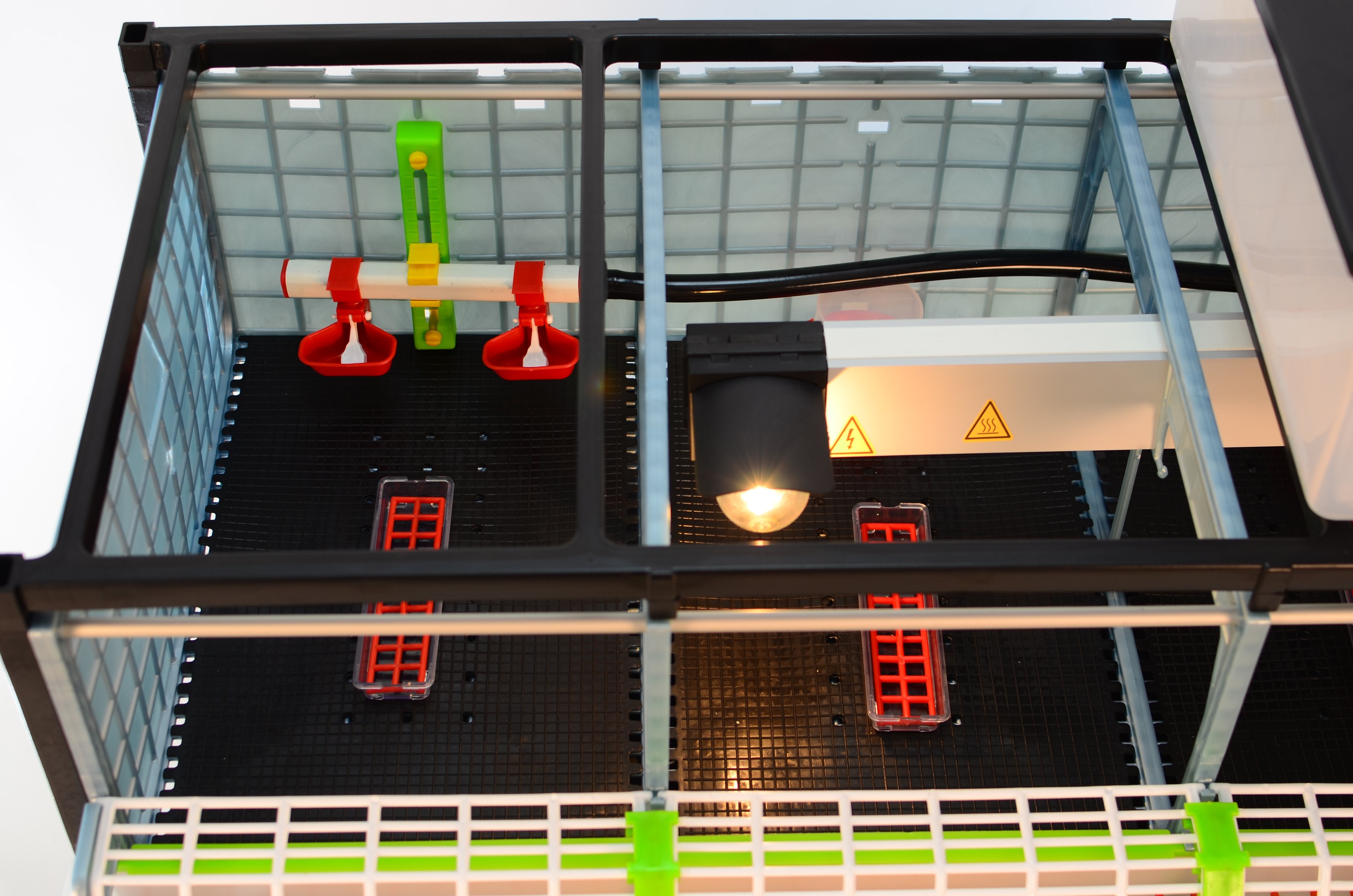 Slip-resistant floor mat for a chick brooder, designed for young chicks.