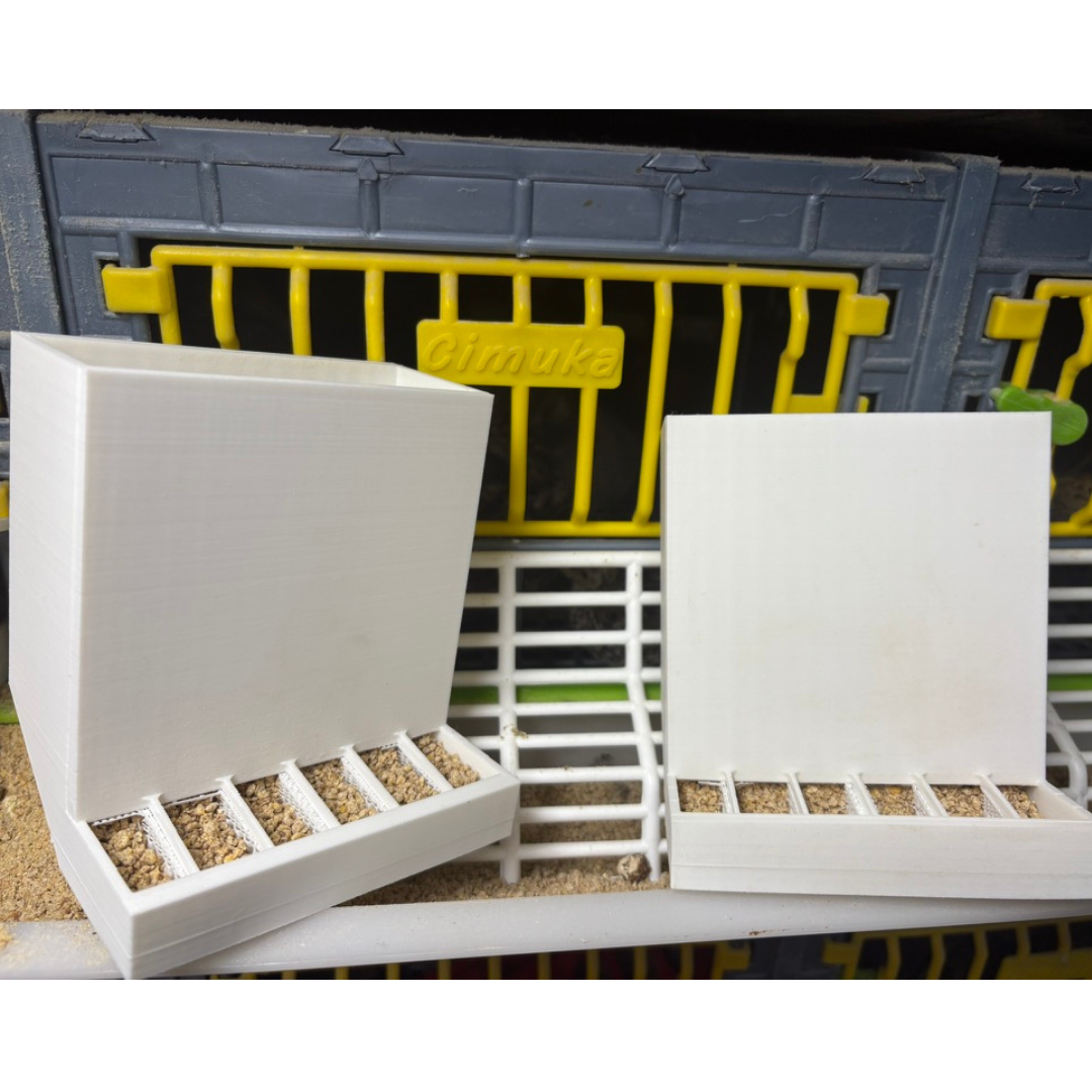 Spill-resistant quail cage feeder